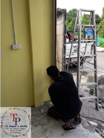 ช่างซ่อมประตูม้วนอัตโนมัติ